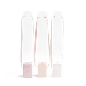 Transparent PVC single rose flower bouquet bag packaging box with colorful base and ribbon.