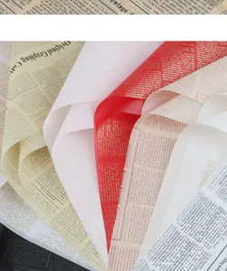 Detail view of retro English newspaper wrapping paper, waterproof floral bouquet material.