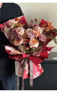 Detailed view of waterproof floral wrapping paper with elegant print, perfect for bouquet styling.