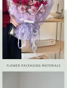 Transparent and purple cellophane flower wrapping paper set with ribbon for bouquets.