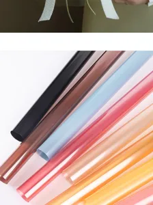 Colorful transparent cellophane wrapping paper rolls for flower bouquets and crafts.