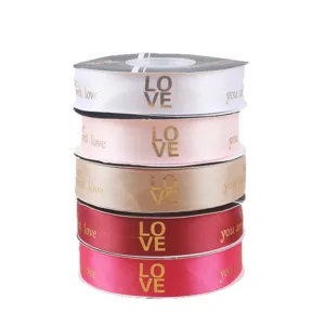 Colorful polyester ribbon set with gold foil love print, ideal for gift wrapping and floral bouquets.