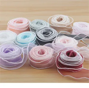 Pearl edge sheer organza ribbon with beads for DIY flower bouquet wrapping and gift box decoration.