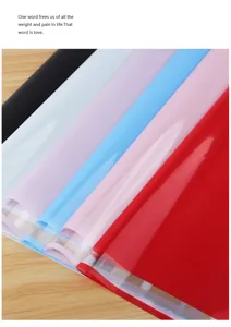 Detailed shot of colorful waterproof floral cellophane wrapping paper rolls for bouquets.