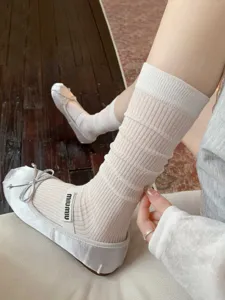 White mesh knee-high socks for women, cute summer student style long stockings detailed.