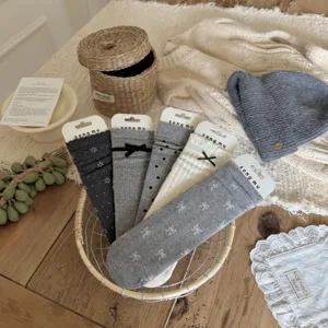 Grey series bow women socks detailed view, comfortable knitted material with elegant aesthetic style.