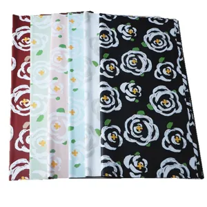 Thick floral wrapping paper with elegant camellia print, waterproof bouquet packaging material for florist.