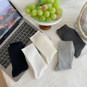 Solid color knit mid-calf socks for women, casual breathable cotton daily wear fashion socks.