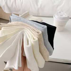 Women's thin breathable solid color mid-tube socks detail shot, casual daily fashion summer wear.