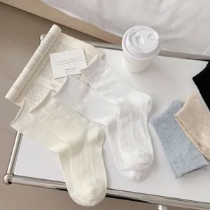 Thin breathable solid color mid-tube women socks, vertical striped casual daily socks detail view.