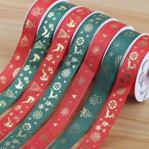 Christmas metallic gold printed ribbons for gift wrapping and DIY crafts bow making.