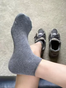 Detail view of thin grey cotton short socks for women, perfect for summer pairing.