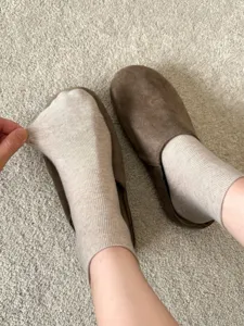 Close-up detail of thin summer cotton socks showing excellent stretch and seamless comfort texture.