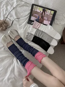 Korean style balletcore slouchy leg warmers with ruffle edge and cotton breathable fabric.