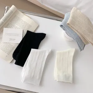 Solid color vertical stripe breathable mid-tube women socks, comfortable casual daily wear.