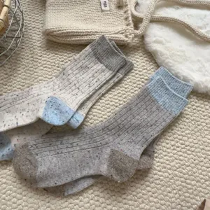 Chaussettes mi-mollet épaisses en tricot chiné pour femmes chaussettes d'hiver chaudes.