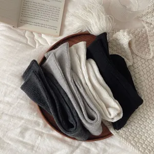 Cozy wool knit slouch socks for women, thick warm winter mid-calf socks in assorted colors.