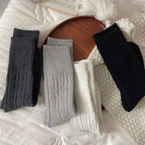 Cozy winter wool blend ribbed mid calf slouch socks in neutral colors for women daily wear.