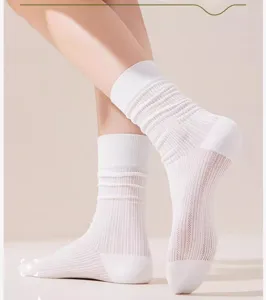 White sheer hollow-out mid-calf socks for women, breathable summer mesh stacked design.