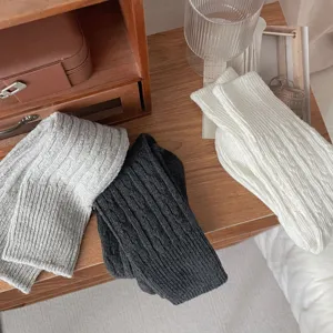 Cozy wool slouchy socks for women, thick warm retro mid-calf knit socks for winter daily wear.