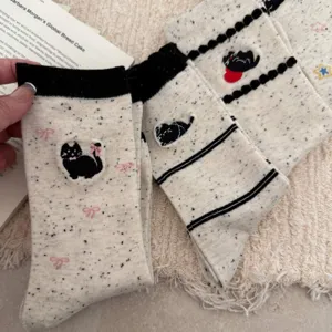 Cute women mid-calf socks featuring adorable black cat embroidery and sweet pink bows detail.