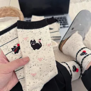 Women cute black cat embroidery mid tube socks with speckled yarn, soft and cozy daily wear.