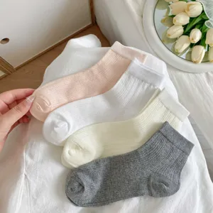 Comfortable spring summer women's ribbed mid-tube socks in four classic colors for daily wear.