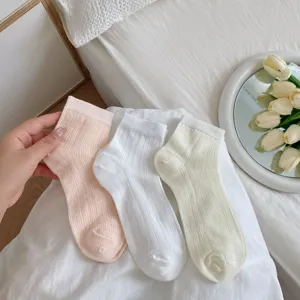 Breathable ribbed mesh mid-calf socks for women, stylish spring summer daily wear.