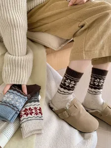 Cozy vintage Fair Isle winter wool socks detail shot, soft warm knit casual thermal crew socks