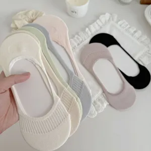 Detail shot of women's shallow invisible boat socks in pastel colors, soft and comfortable.