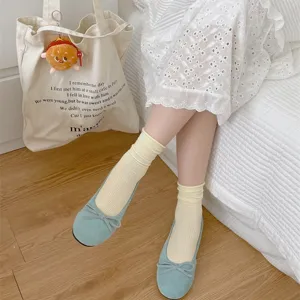 Yellow ribbed mid-tube slouch socks for women, breathable cotton cute casual hosiery.