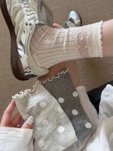 Women's sheer dotted crew socks with cute ruffled lace trim for summer breathable wear.