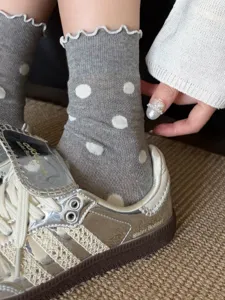 Grey polka dot socks detail view, breathable mesh lace top, soft comfortable summer knitwear.