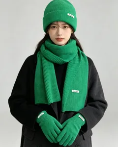 Green knit beanie scarf and gloves winter set detailed view showcasing soft texture and quality.