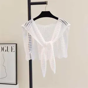 White hollow out knit shawl detail, stylish summer beach cover up cape with tie front design.
