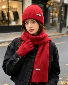 Winter red knitted three piece set hat scarf gloves for women, cozy thermal warm outdoor wear.