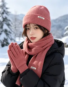 Pink winter knit beanie scarf and gloves three piece set for women, cozy cold weather snow gear.