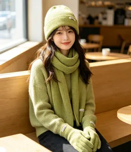 Cozy winter three-piece knit set featuring a warm beanie, soft scarf, and comfortable gloves.