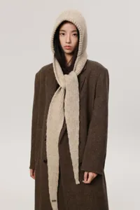 Knit hooded scarf detail view, beige ribbed wool blend balaclava style winter cozy warm accessory.