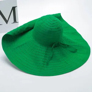 Groene zonnehoed met brede rand, opvouwbare zomerse strandhoed voor dames met strik.