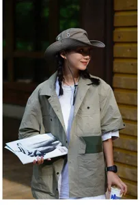 Outdoor sun protection bucket hat for camping and hiking, stylish western cowboy gear.