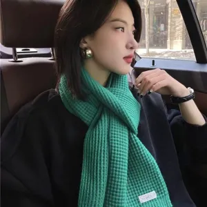 Green knitted winter scarf for women, soft cozy warm ribbed wool scarf for cold weather daily wear.