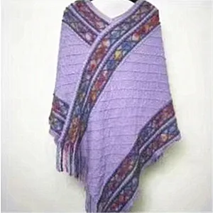 Detailed view of a cozy purple knit poncho with vibrant patterned borders and soft fringe.