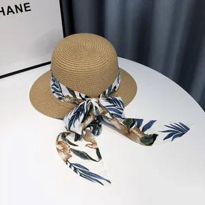 Damen Sommer Stroh Sonnenhut mit Blumenband Schleife, perfekt für Outdoor Strand Urlaub und Alltag.