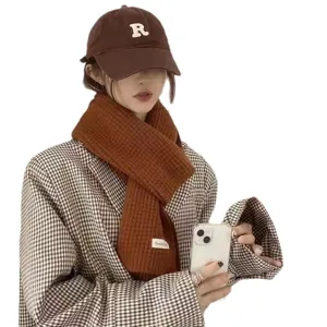 Winter warm knitted wool scarf and cap set for women, cozy and versatile brown neck warmer.