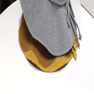 Breathable knitted sun hat summer foldable beach fisherman hat detail view showing grey and yellow