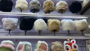 Plush winter warm hat cute bear ear fluffy thick knitted bucket hat retail display.