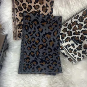 Winter leopard print knitted scarf for women, thick warm wool blend fashion neck warmer.