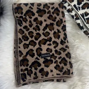Cozy leopard print knitted winter scarf for women, thick warm wool blend fashion neckerchief.