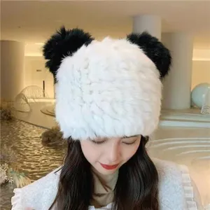 Detailed view of the cute panda ear plush winter warm hat, soft faux fur texture for cold weather.